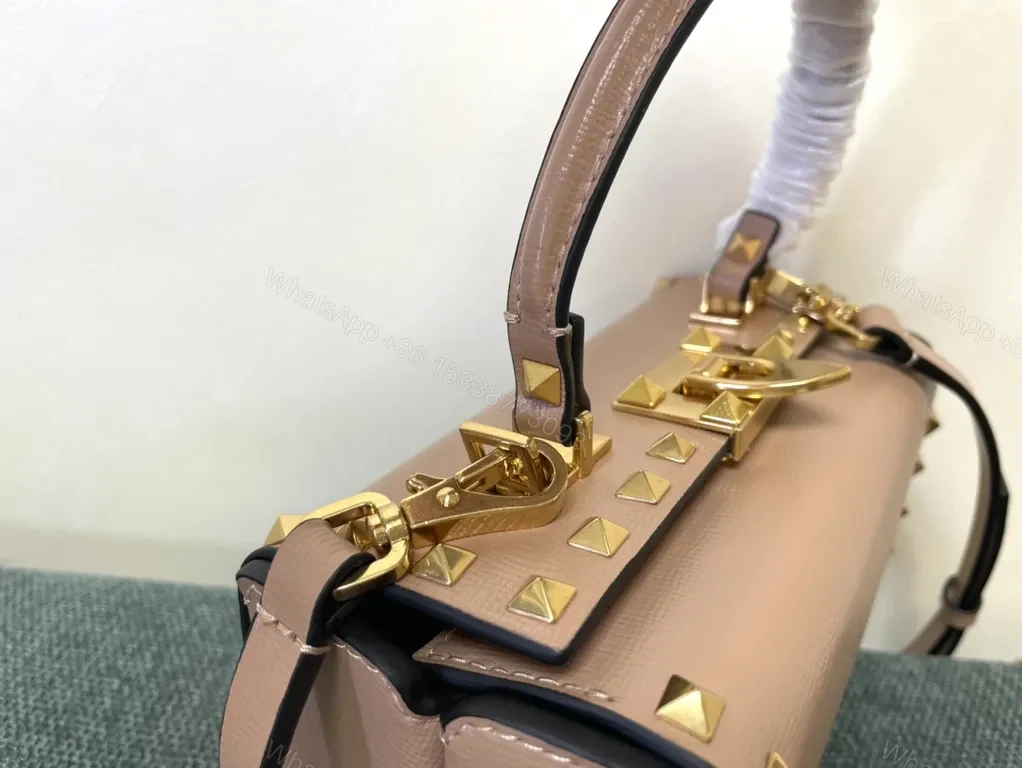 View 5 of Chic Pink Rockstud Mini Bag: Compact Luxury Handbag