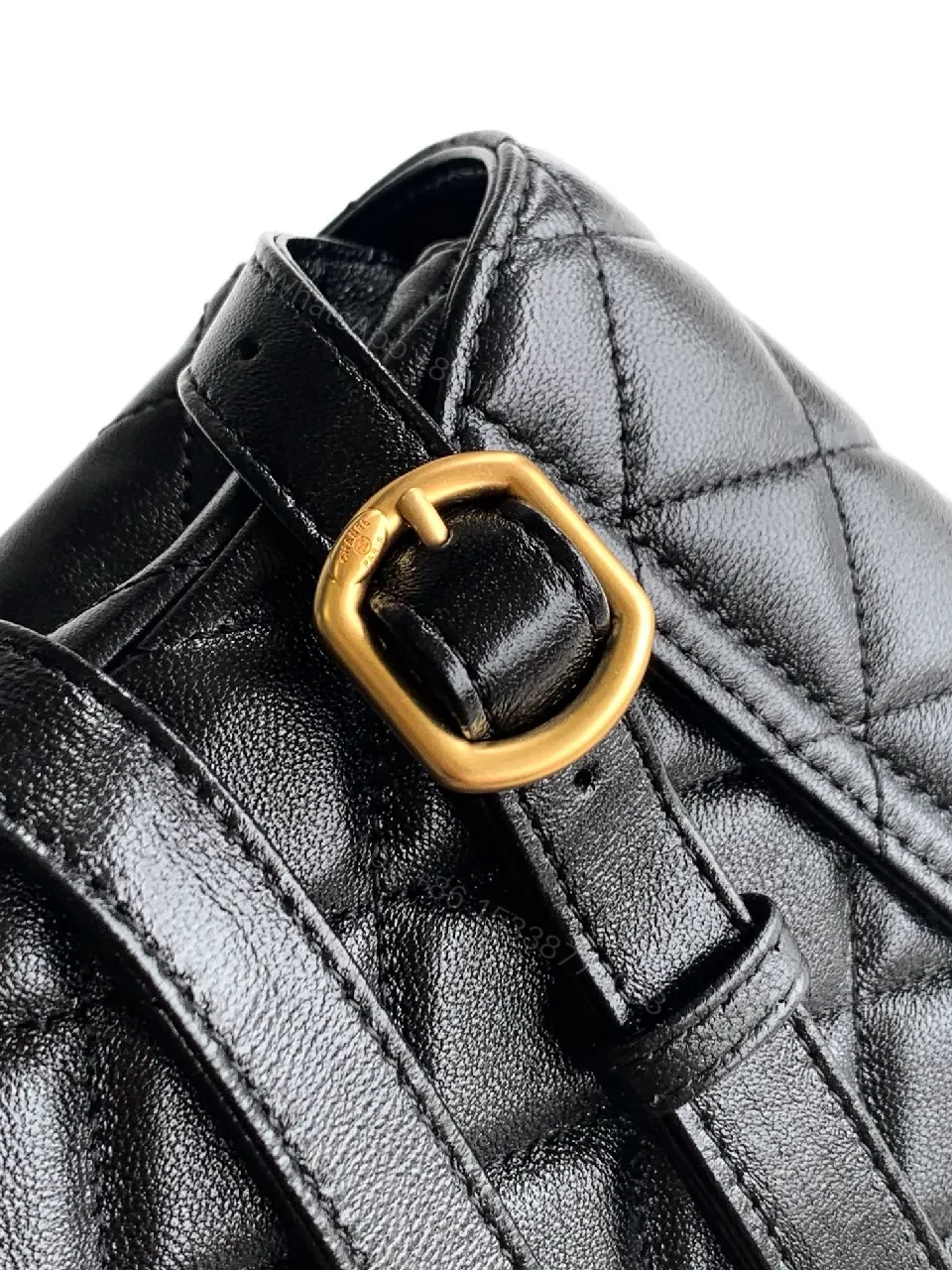 View 3 of Compact Quilted Black Camera Bag with Gold Hardware