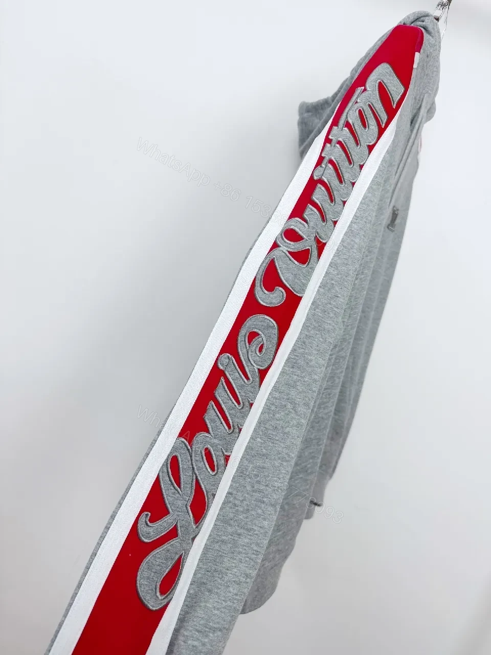 View 9 of Grey Mélange Hoodie with Red Tape – Premium Comfort & Embroidery