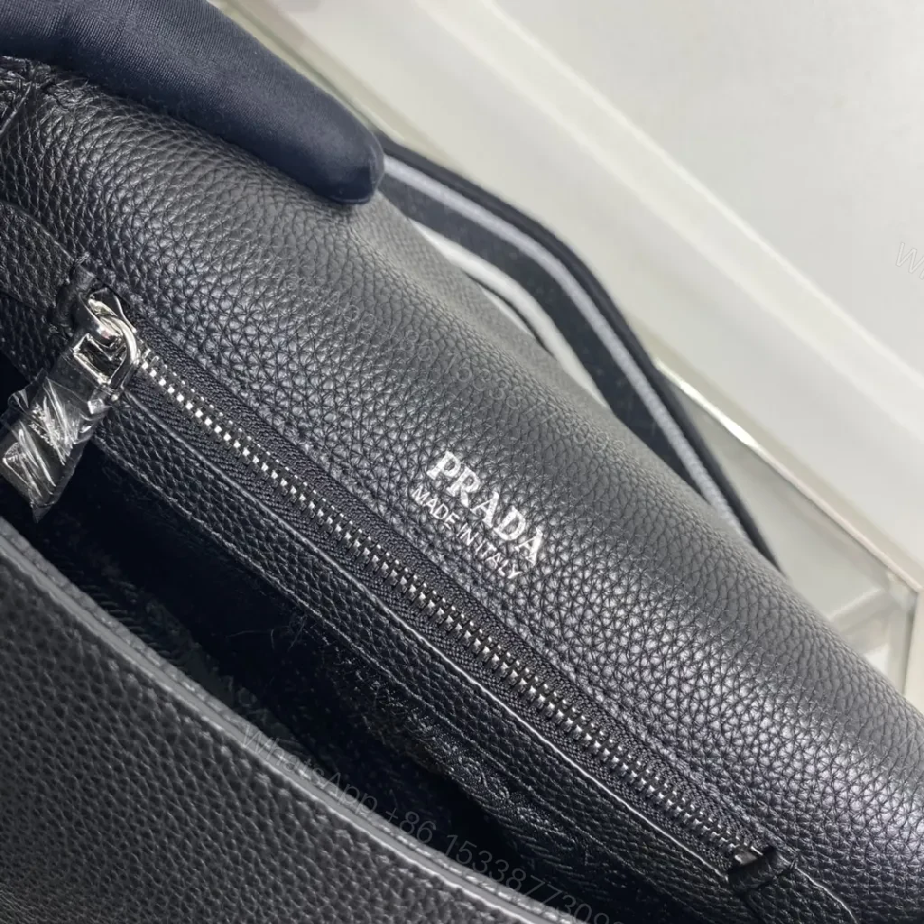 View 8 of Black Pebble-Grain Crossbody: Luxe Slim with Signature Hardware