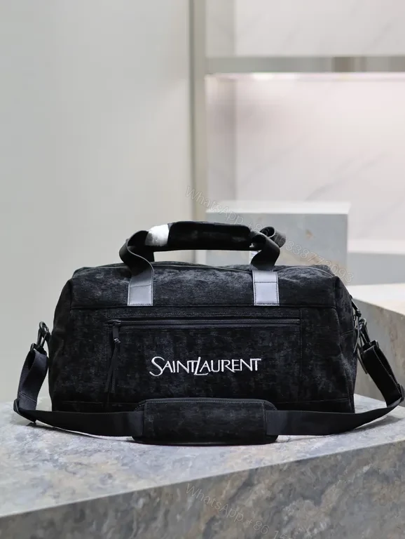 Structured Black Duffle: Luxe Texture, Organized Utility — view 1