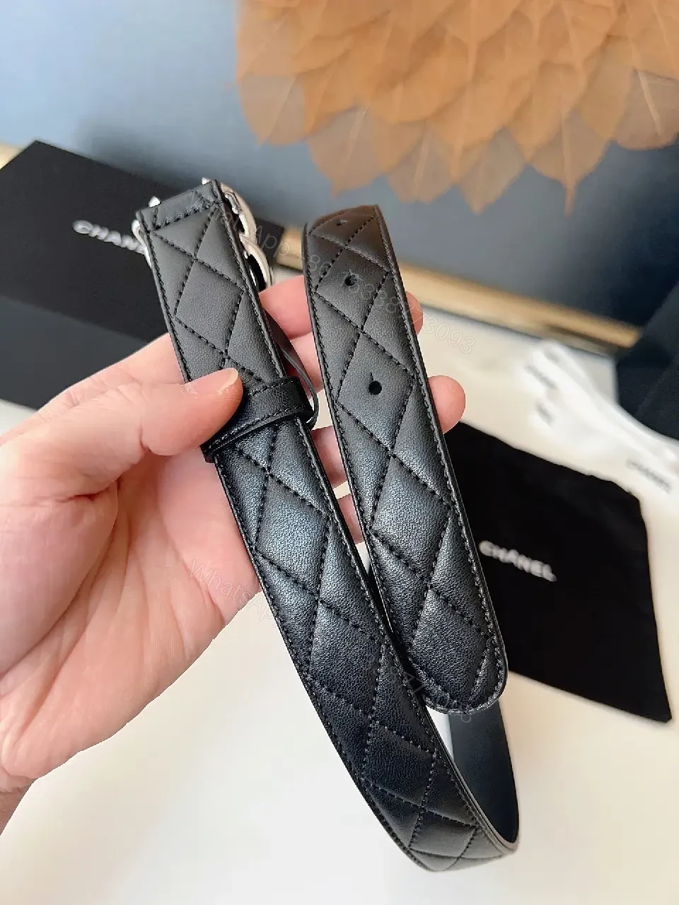 View 7 of Quilted Leather Belt with Signature Buckle - Black - Slim