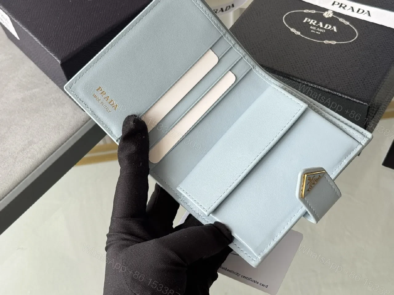 View 4 of Blue Saffiano-Like Bifold Wallet with Triangle Closure, Minimal Luxury