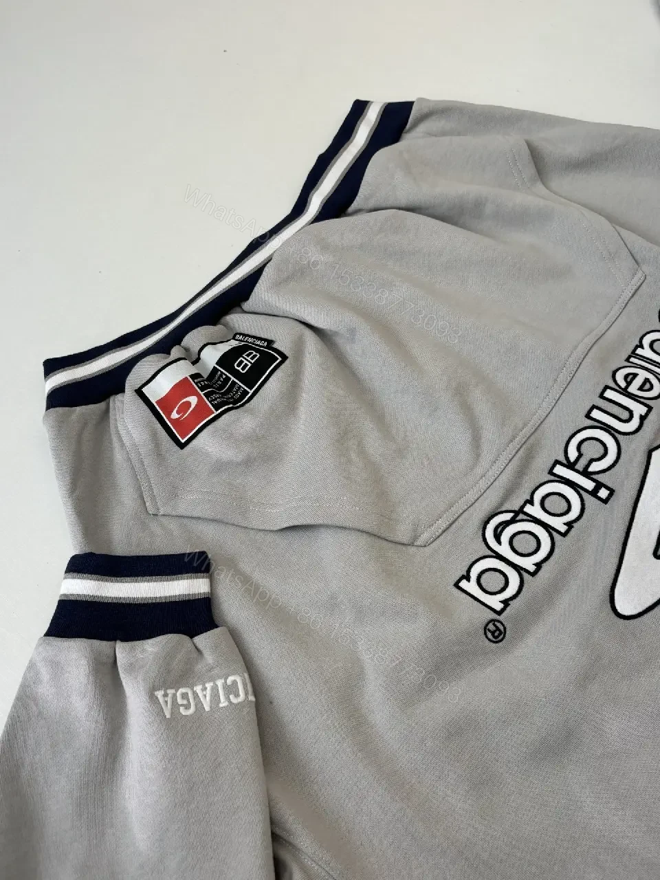 View 9 of Soft-Edge Comfort Hoodie: Graphic Branding, Oversized Streetwear