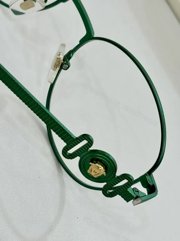 View 8 of Refined Round Eyewear: Luxury Metal Frames with Signature Detail