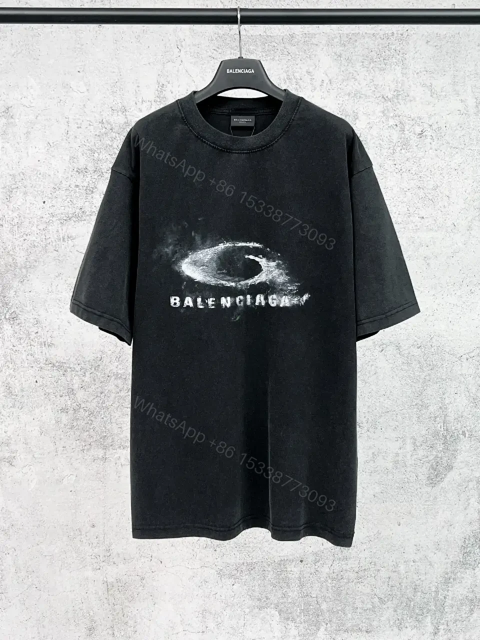 View 2 of Oversized Black Cotton Tee with Distressed Logo – Avant-Garde Streetwear