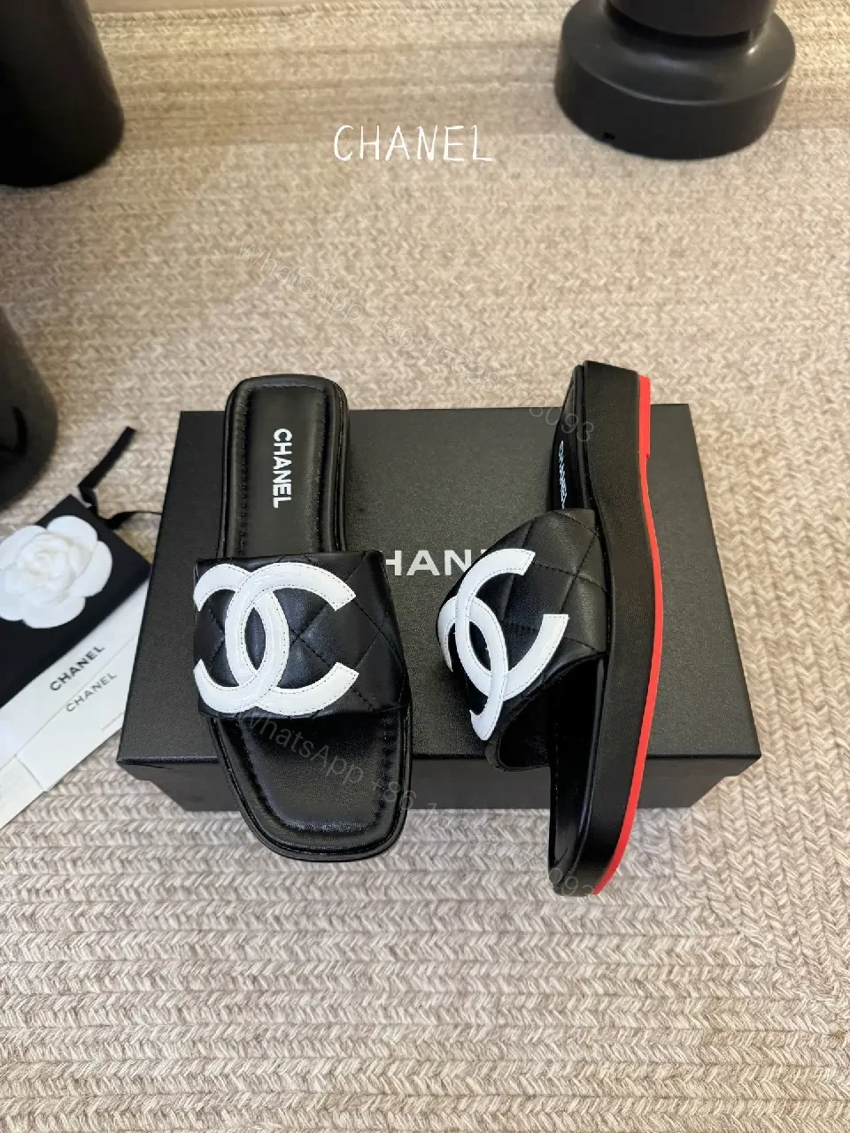 View 2 of Interlocking Logo Slip-Ons: Black & White Luxury Sandals