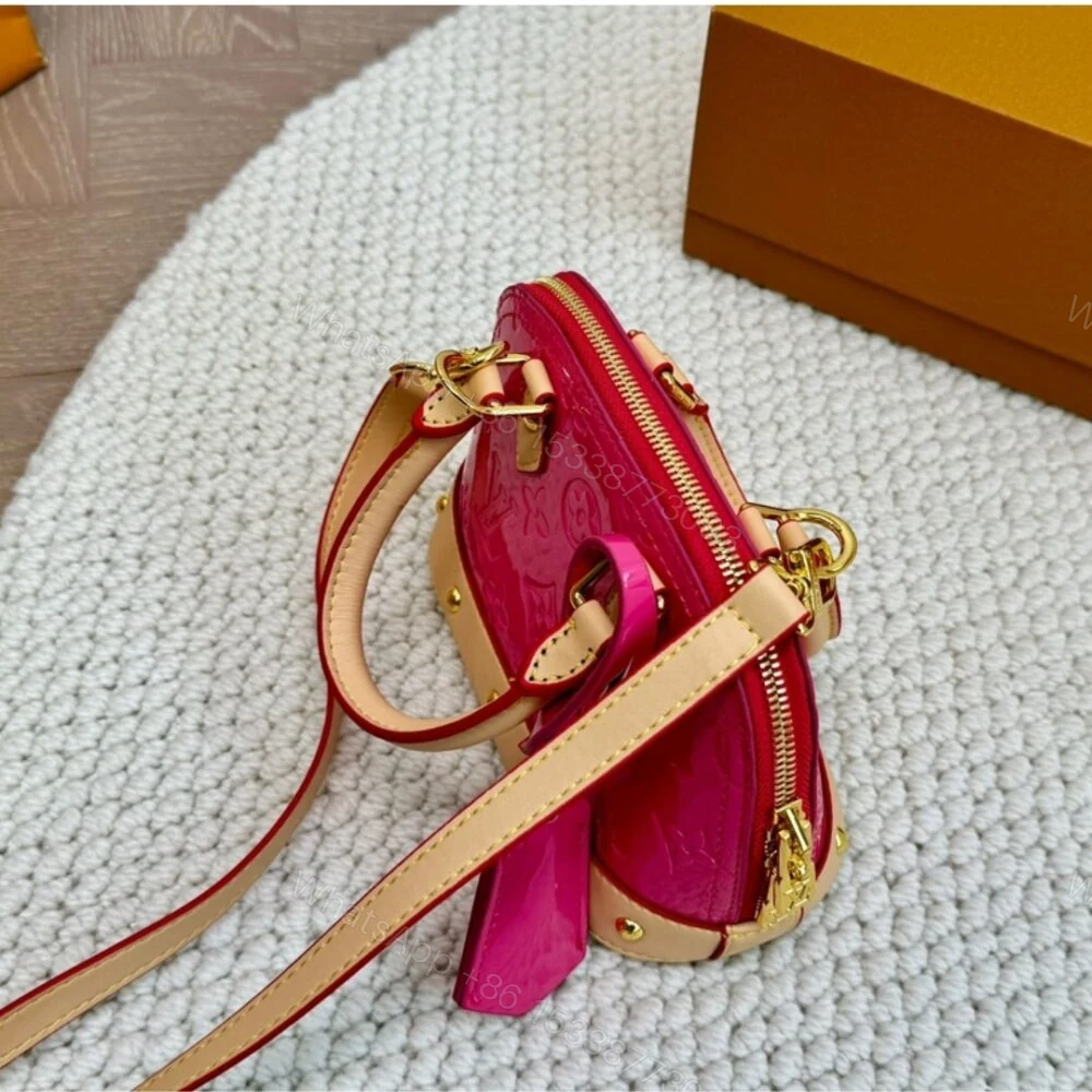 View 5 of Louis Vuitton Alma Nano Monogram Vernis Embossed Neon Pink 18Cm M90611