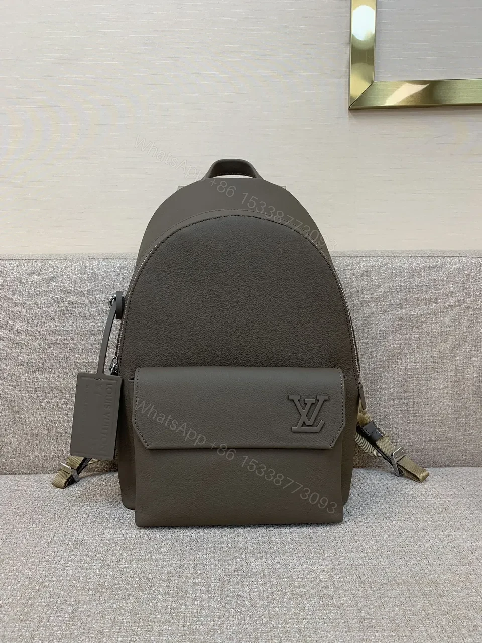 Structured Minimalist Leather Backpack with Subtle LV Motif — view 1