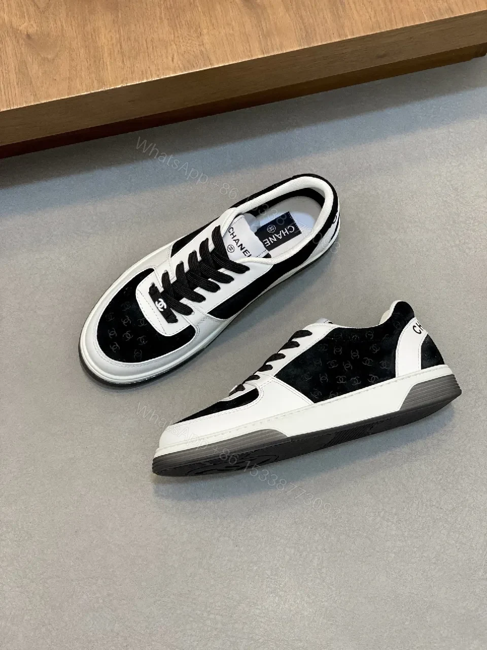 Monochrome Leather Low-Top Sneakers: Luxury Comfort — view 1