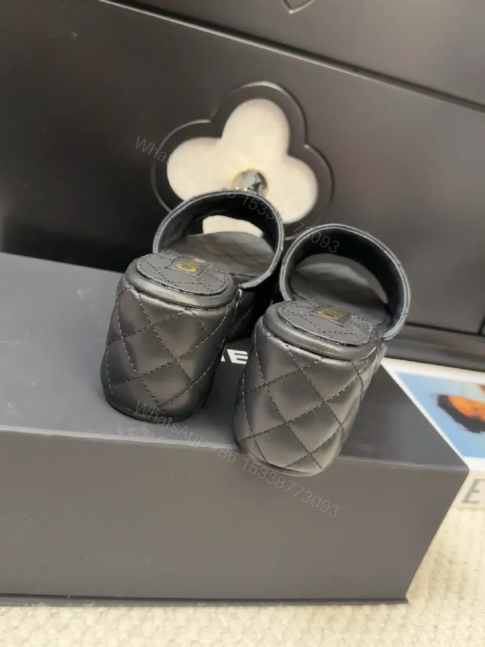 View 9 of Chic Quilted Mules: Black Vegan Leather, Gold Logo Slide