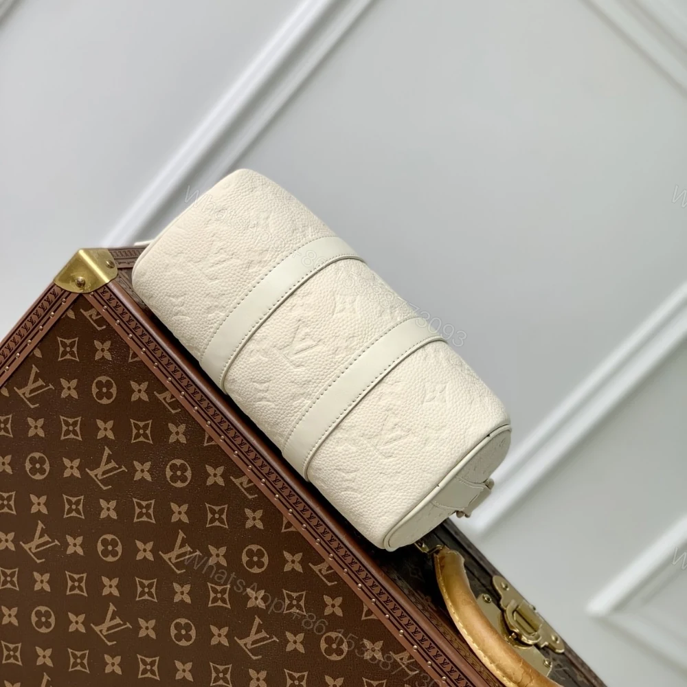 View 5 of Louis Vuitton Keepall Bandoulière 25 Bag Cream 25Cm M24434