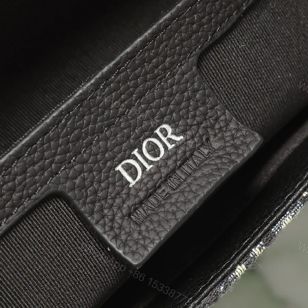 View 5 of Texture-Black Leather & Canvas Crossbody with Monogram Pattern, Compact, Everyday Luxury Bag
