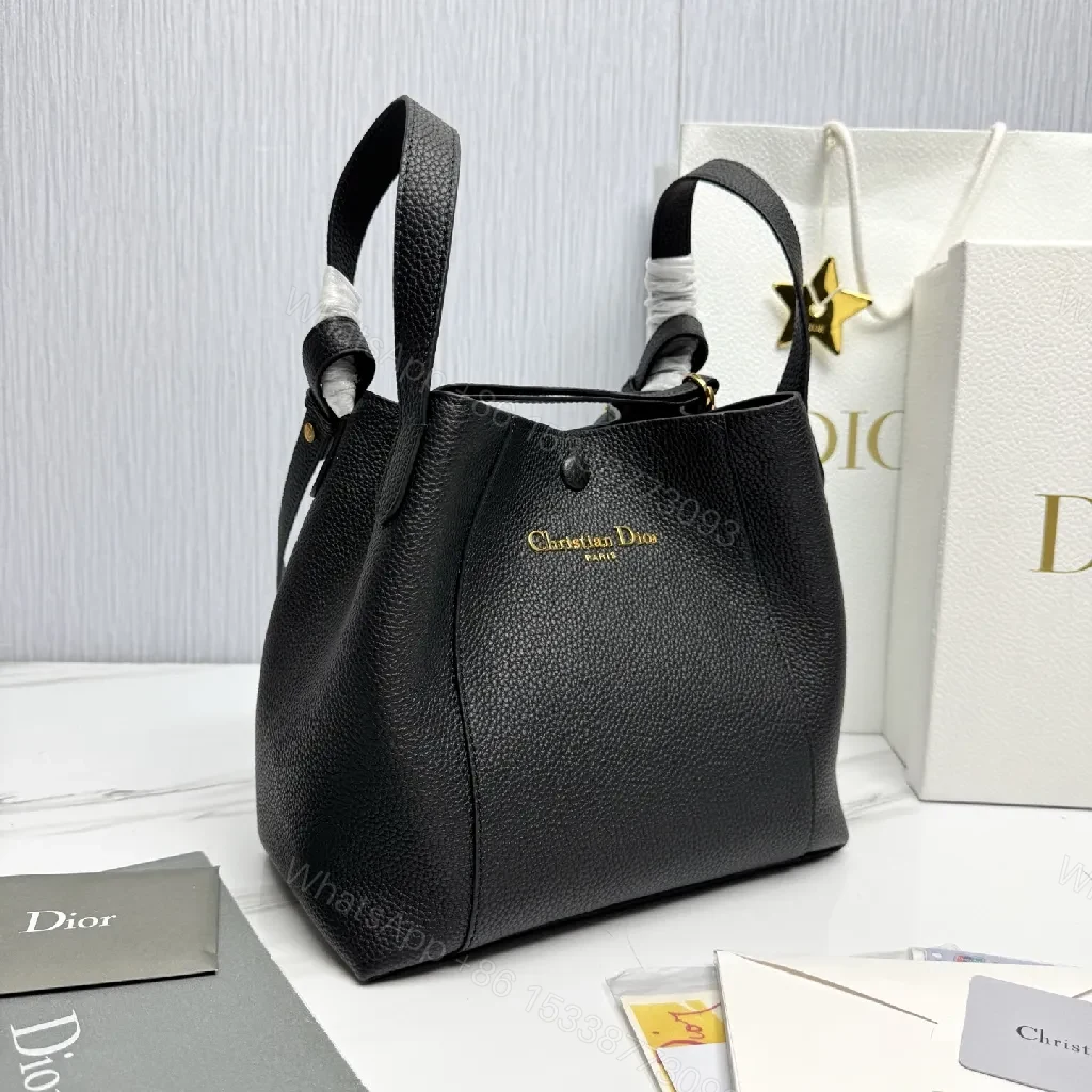 View 8 of Compact Black Pebbled Bucket Bag - Structured Luxury Everyday