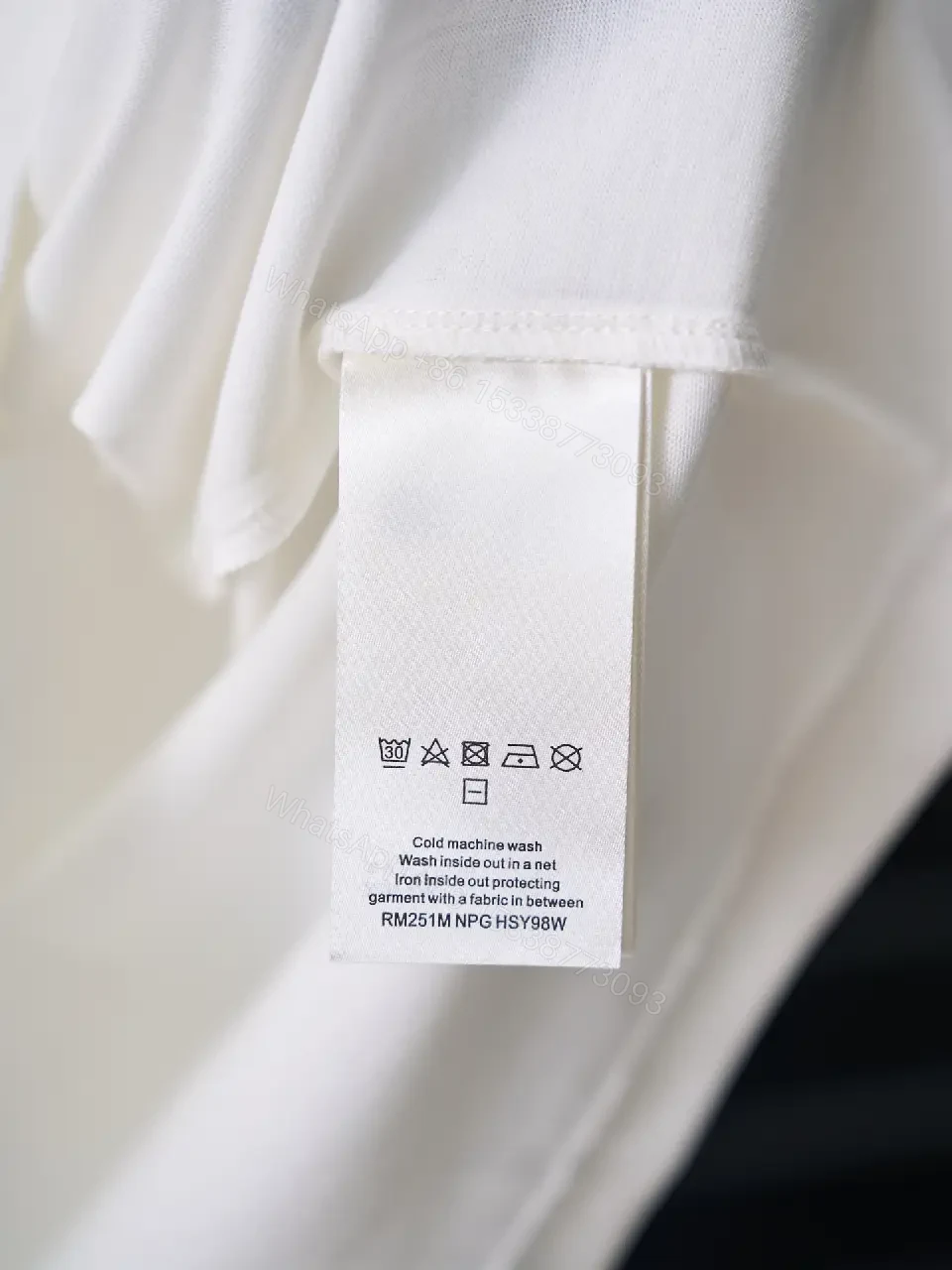 View 5 of White cotton T-shirt with luxury script embroidery for everyday elegance