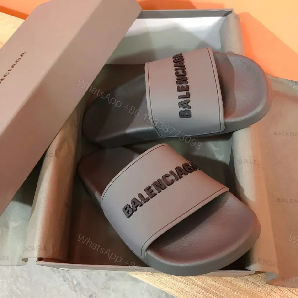 View 2 of Minimalist Designer Slides in Neutral Faux Leather with Bold Logo Strap