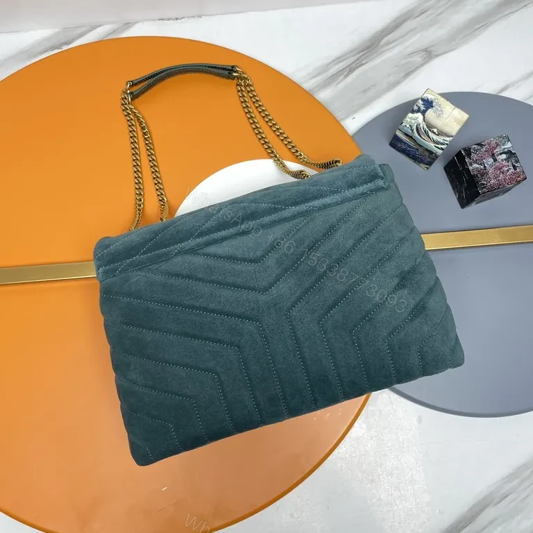 View 8 of Chic Teal Suede Quilted Shoulder Bag with Gold Monogram