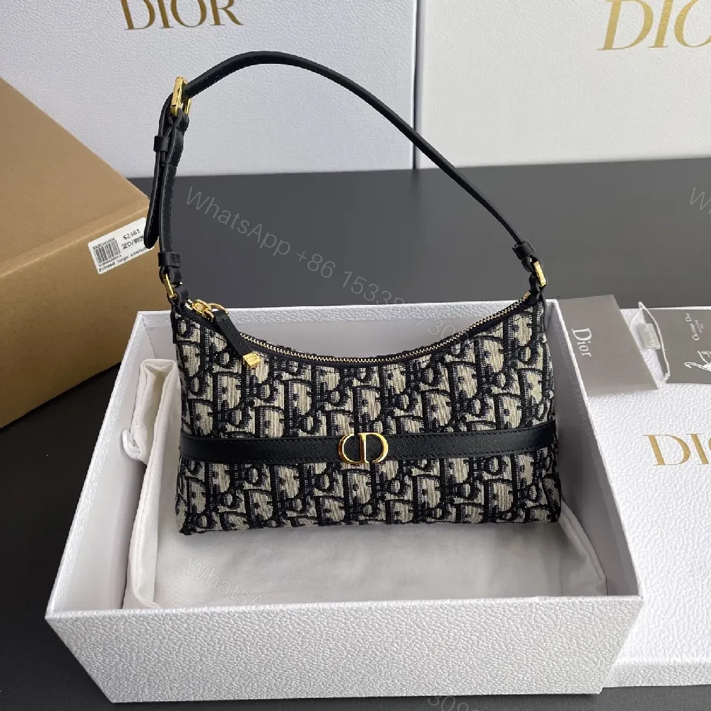 Chic Monogram Mini Bag: Patterned Luxury, Elev. Versatility — view 1