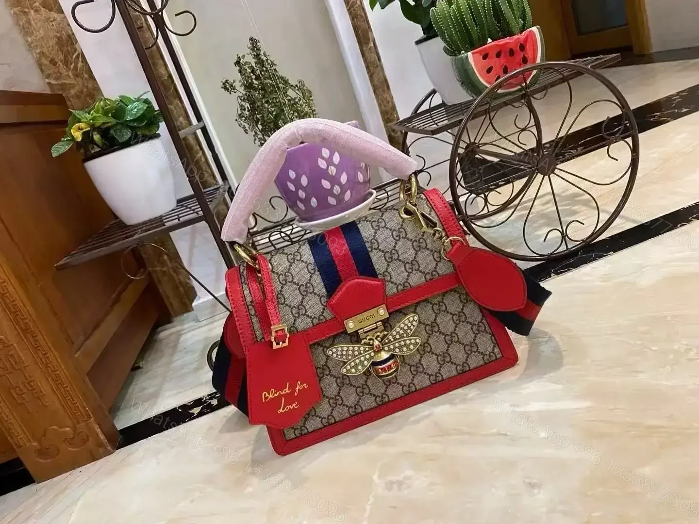 GUCCI GG Supreme Queen Margaret Top Handle Shoulder Bag — view 1