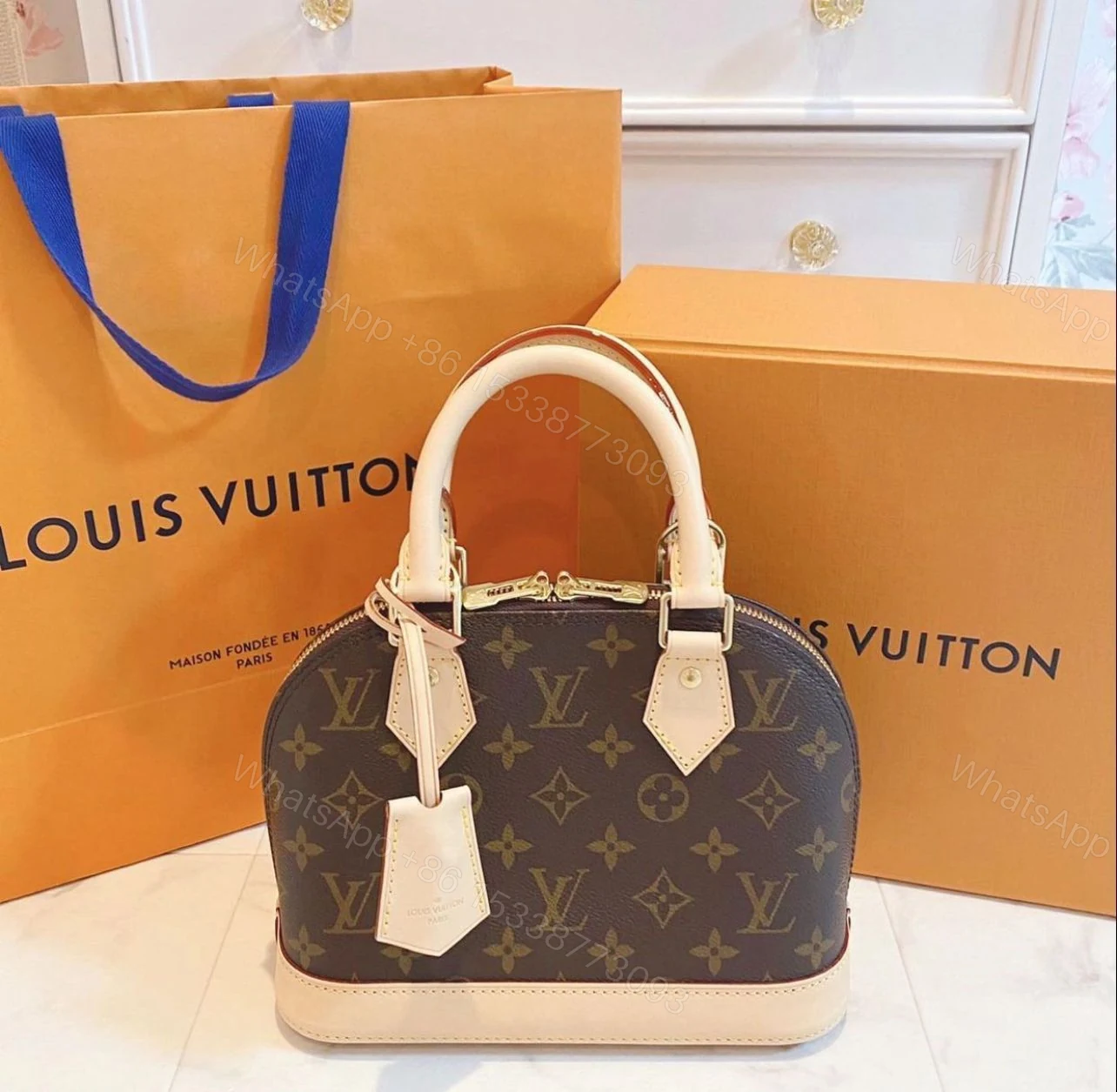View 3 of First Copy Louis Vuitton Mono Alma Brown Premium Handbag with OG Box
