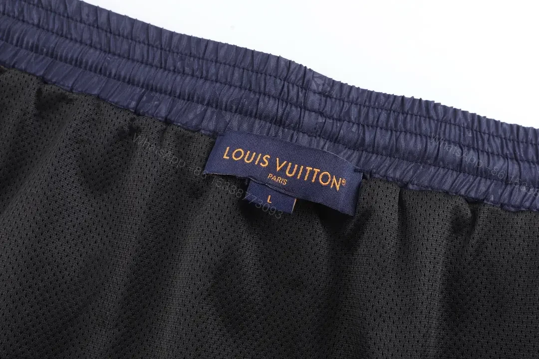 View 3 of Blue Leather-Look Louis Vuitton Monogram Print Shorts