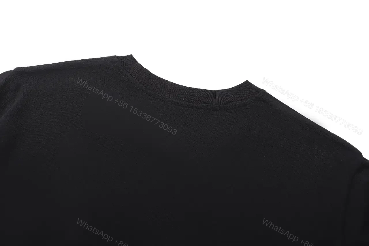 View 7 of Minimalist Cotton Crest Tee - Black Luxe Tee