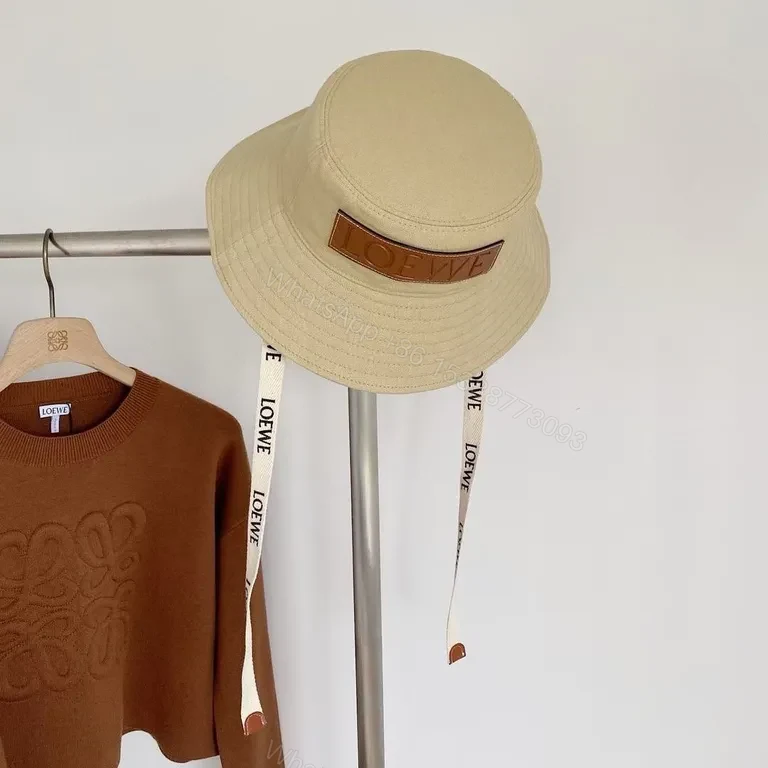 View 5 of Beige Cotton Bucket Hat with LOEWE Patch - Luxury Streetwear