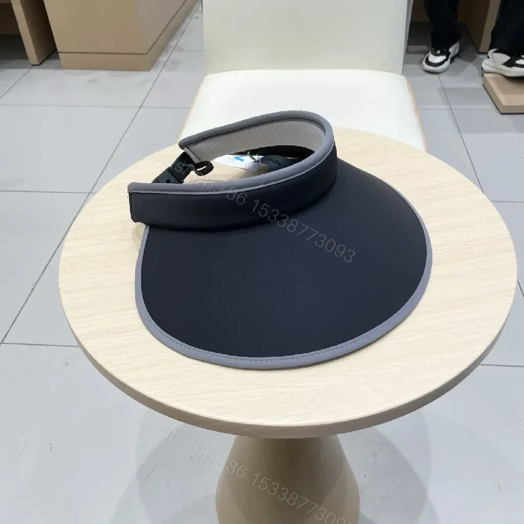 View 6 of Minimalist Black Visor with Chanel-Inspired Detail, UV Shield