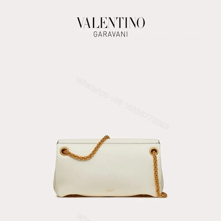 View 5 of Chic White Rockstud Shoulder Bag â€“ Everyday Luxury