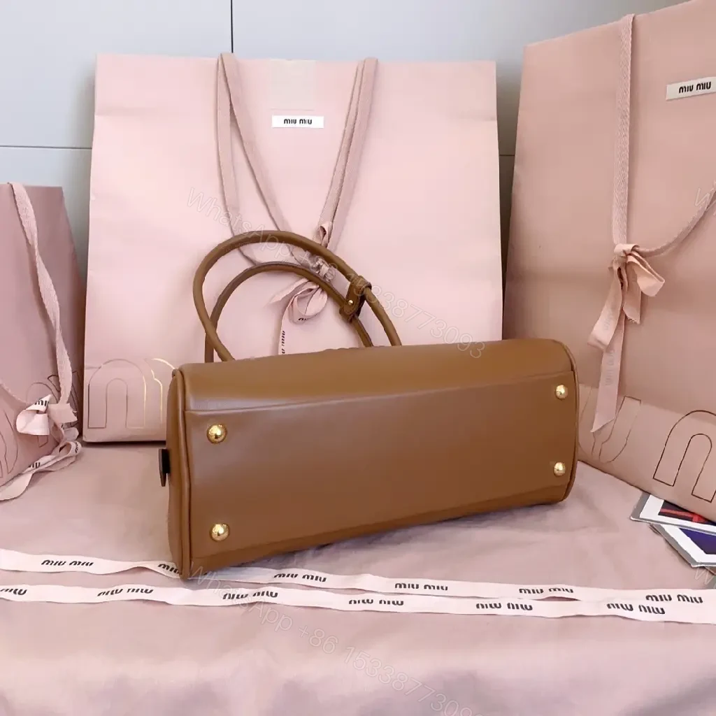 View 10 of Caramel Leather Dome Bag: Structured Luxury, Minimal Detailing
