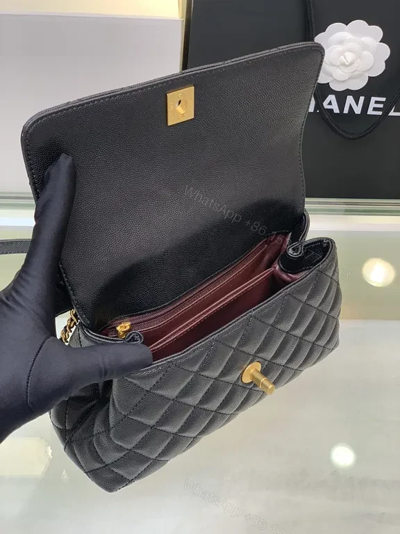 View 2 of Chic Quilted Black Handbag with Gold Twist â€” All-Day Comfort