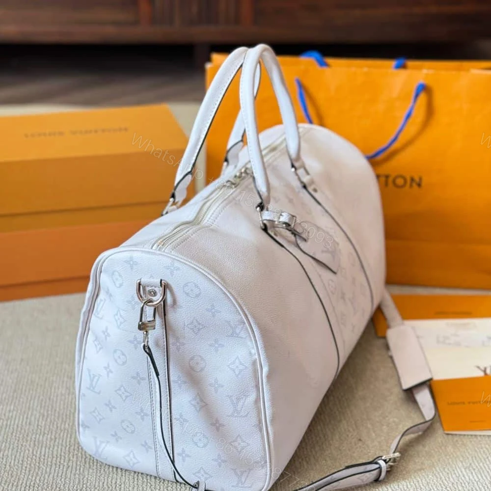 View 4 of Louis Vuitton Keepall 5 Bandouliere Optical White 40Cm M30885