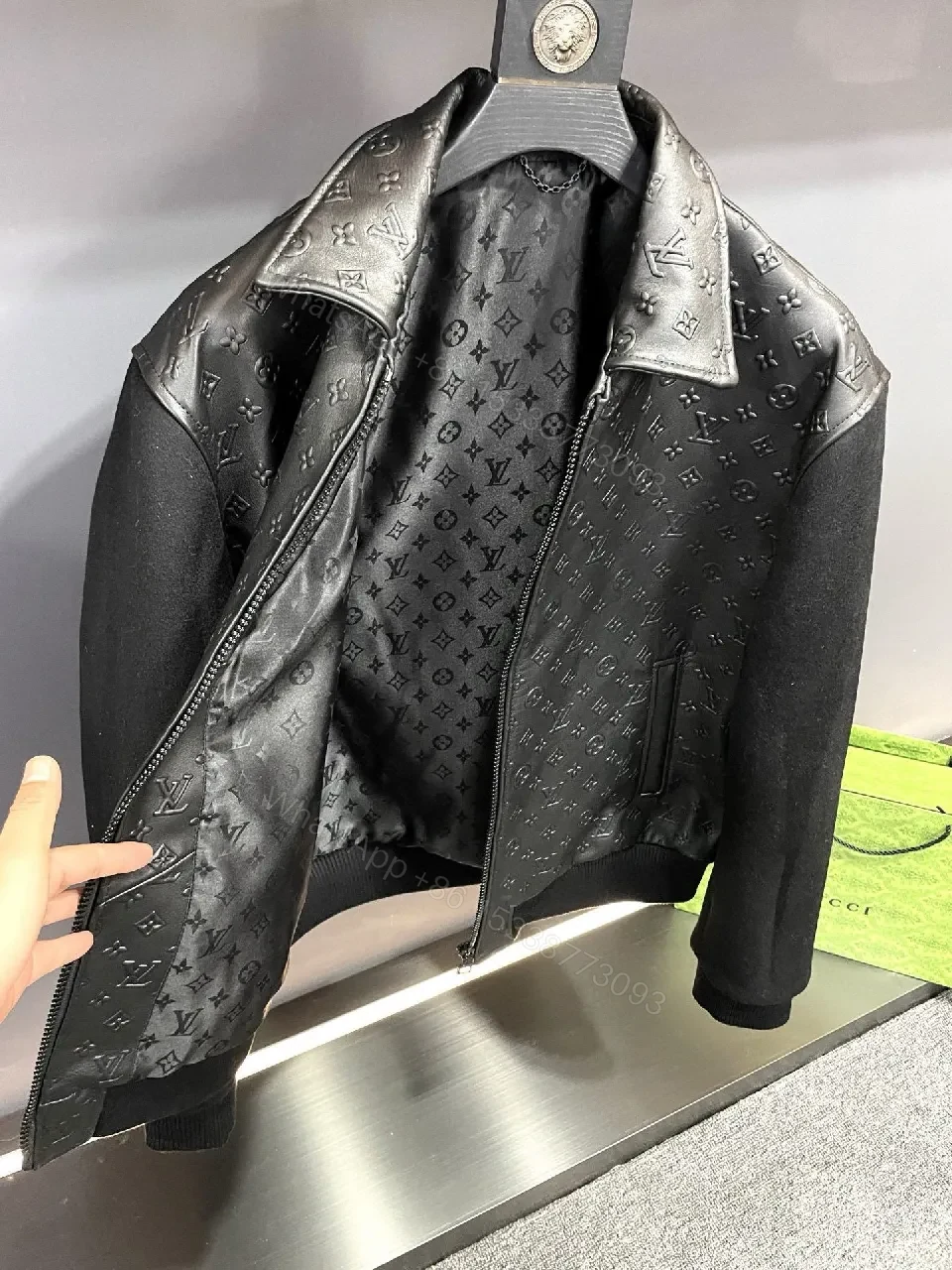 View 5 of Monochrome Leather-Embossed Varsity Jacket: Luxe Texture