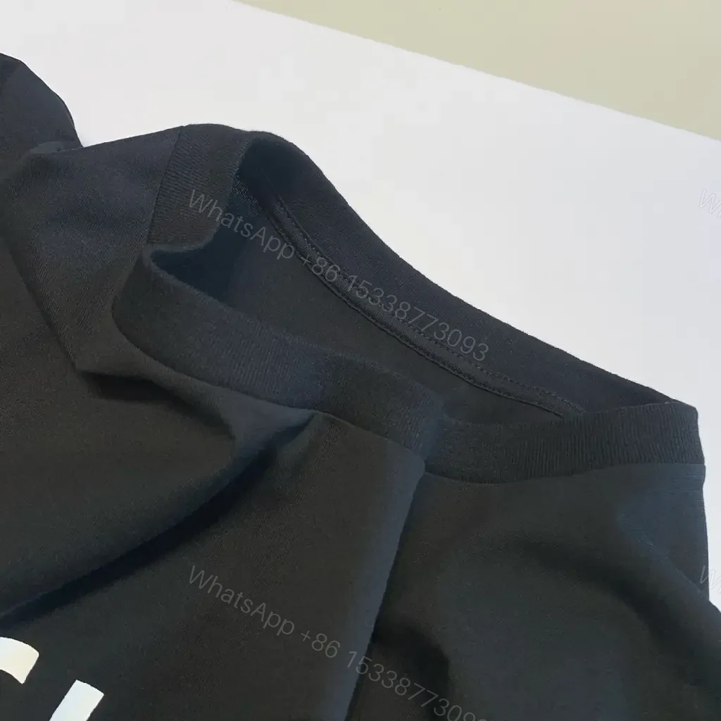 View 8 of Bold Minimalist Black Logo Tee: Everyday Luxe