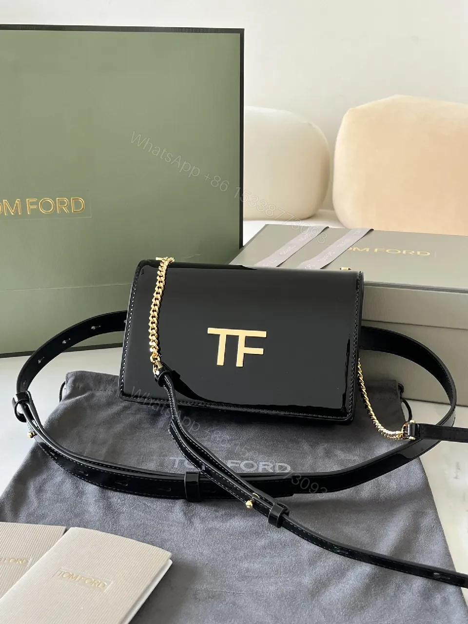 View 6 of Compact Black Leather Crossbody with Gold TF Emblem