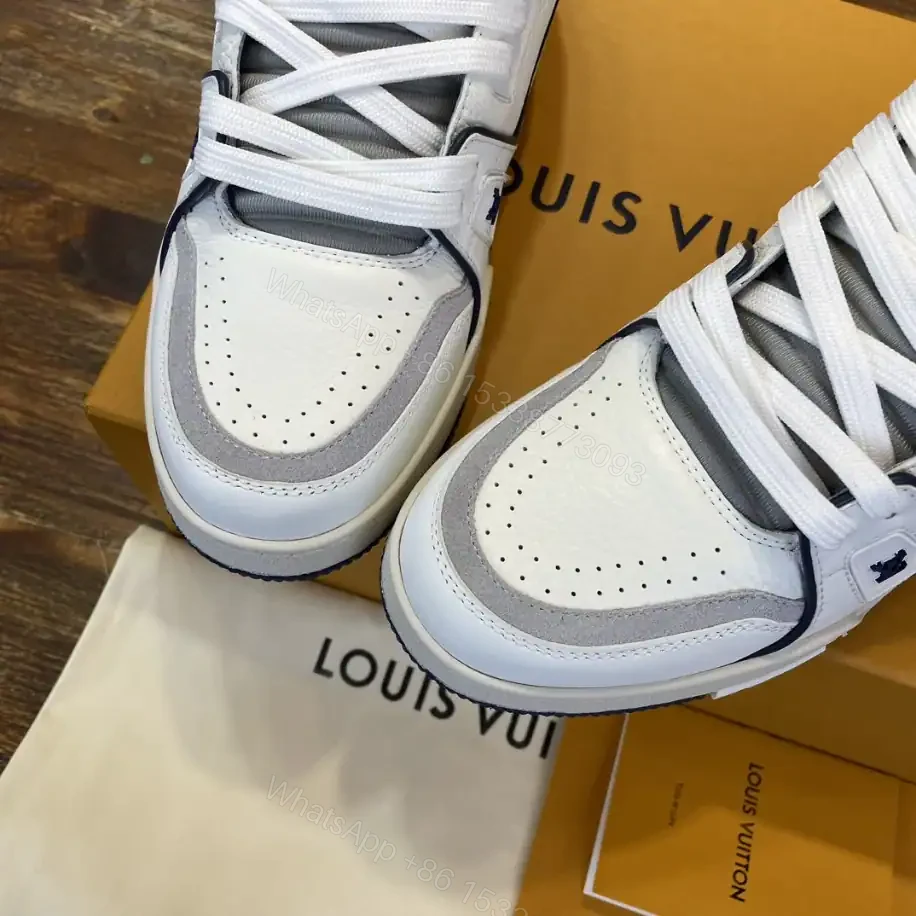 View 3 of LOUIS VUITTON LV TRAINER SNEAKERS IN WHITE AND NAVY BLUE – LSVT353
