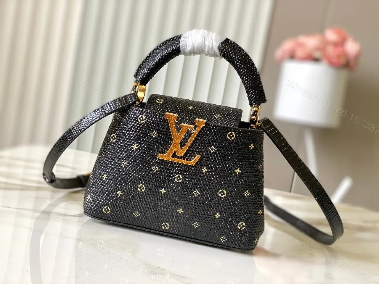 View 10 of Compact Black Pebble-Grain Top-Handle Bag with Gold Hardware