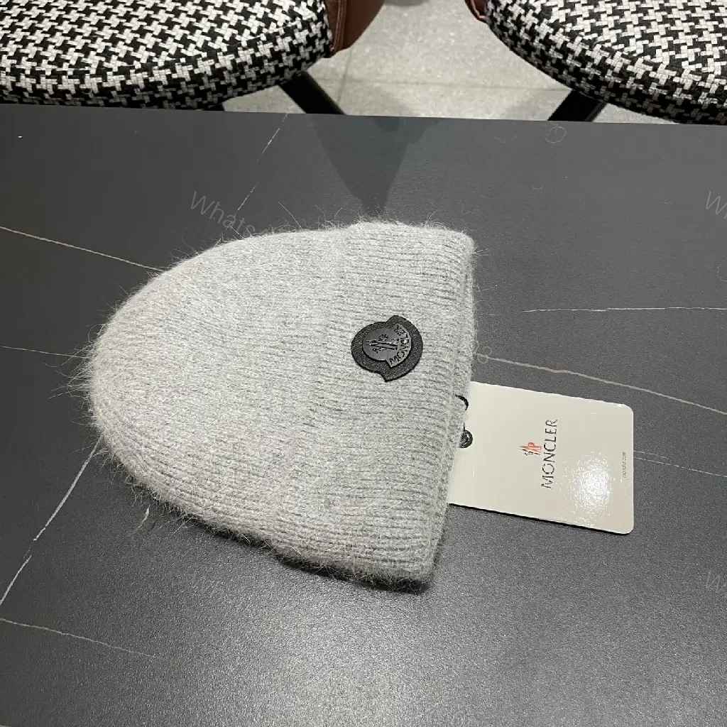 View 12 of Cozy Perimeter Beanie: Textured Knit, Subtle Emblem, Neutral Gray
