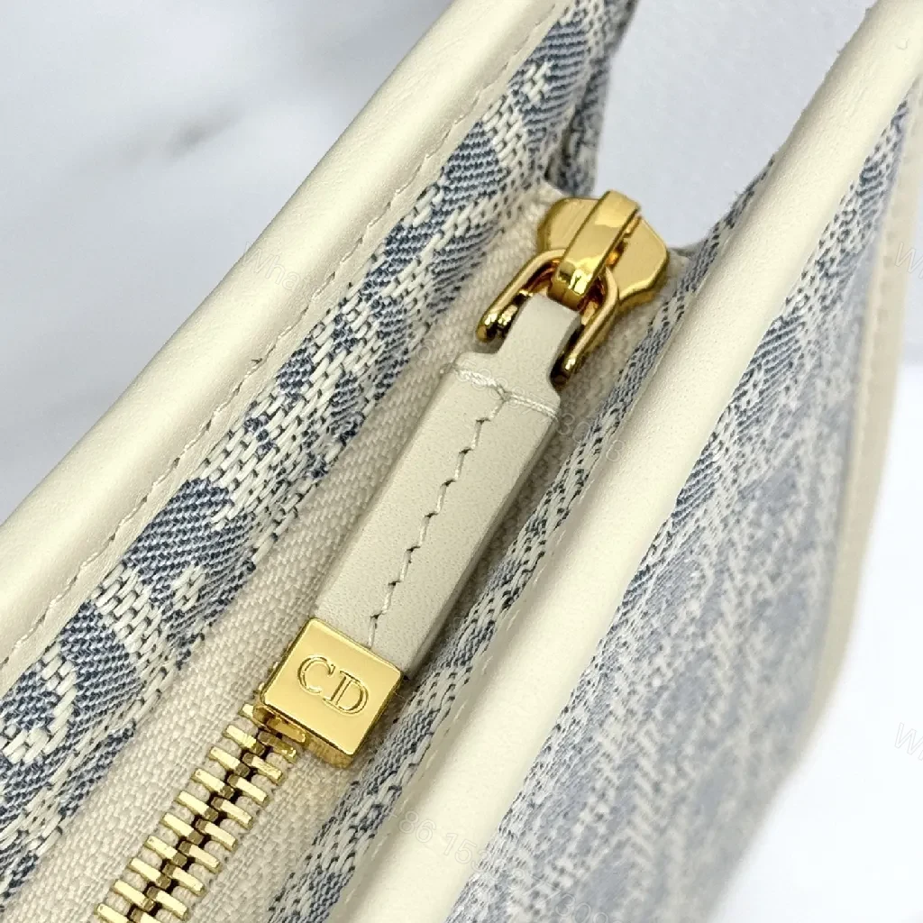View 5 of Textured Monogram Carryall: Structured Luxury Handbag