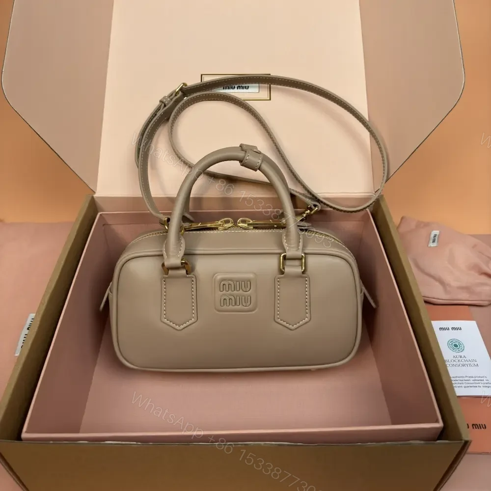 View 9 of 高仿miumiu*Arcadie系列5BB142小牛皮斜挎包沙色免檢版