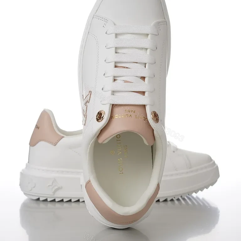 View 9 of Polished Everyday Comfort: White Leather Sneaker with Blush LV Accent