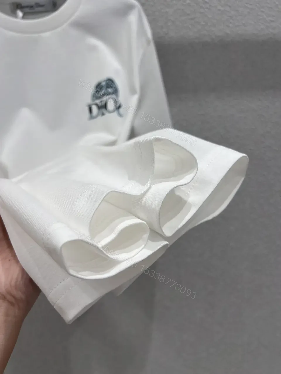 View 4 of Minimalist White Cotton Tee with Crest – Everyday Luxe T‐Shirt