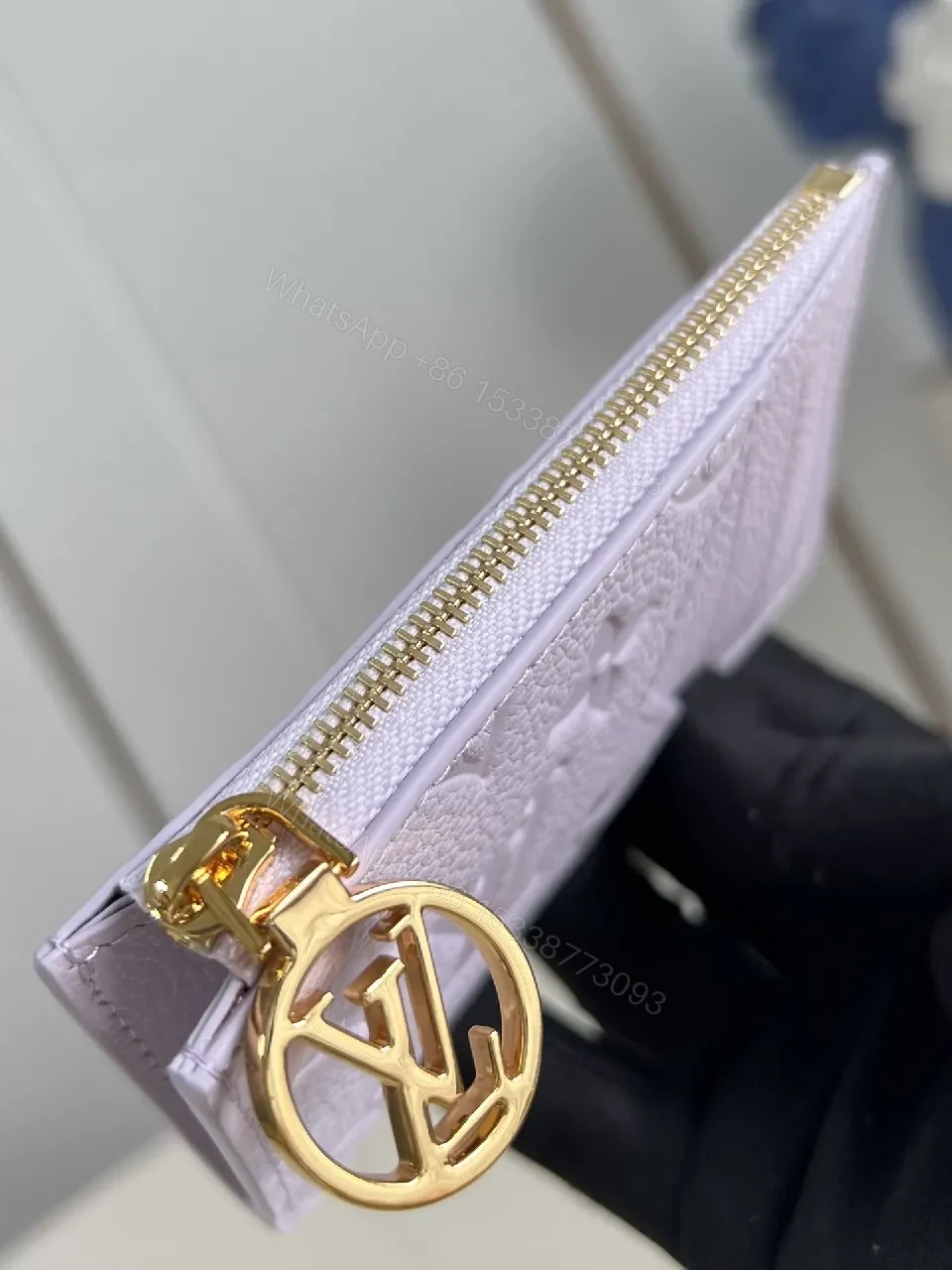 View 3 of Soft Monogram Wallet: Gold LV Charm, Compact Luxury, Leather