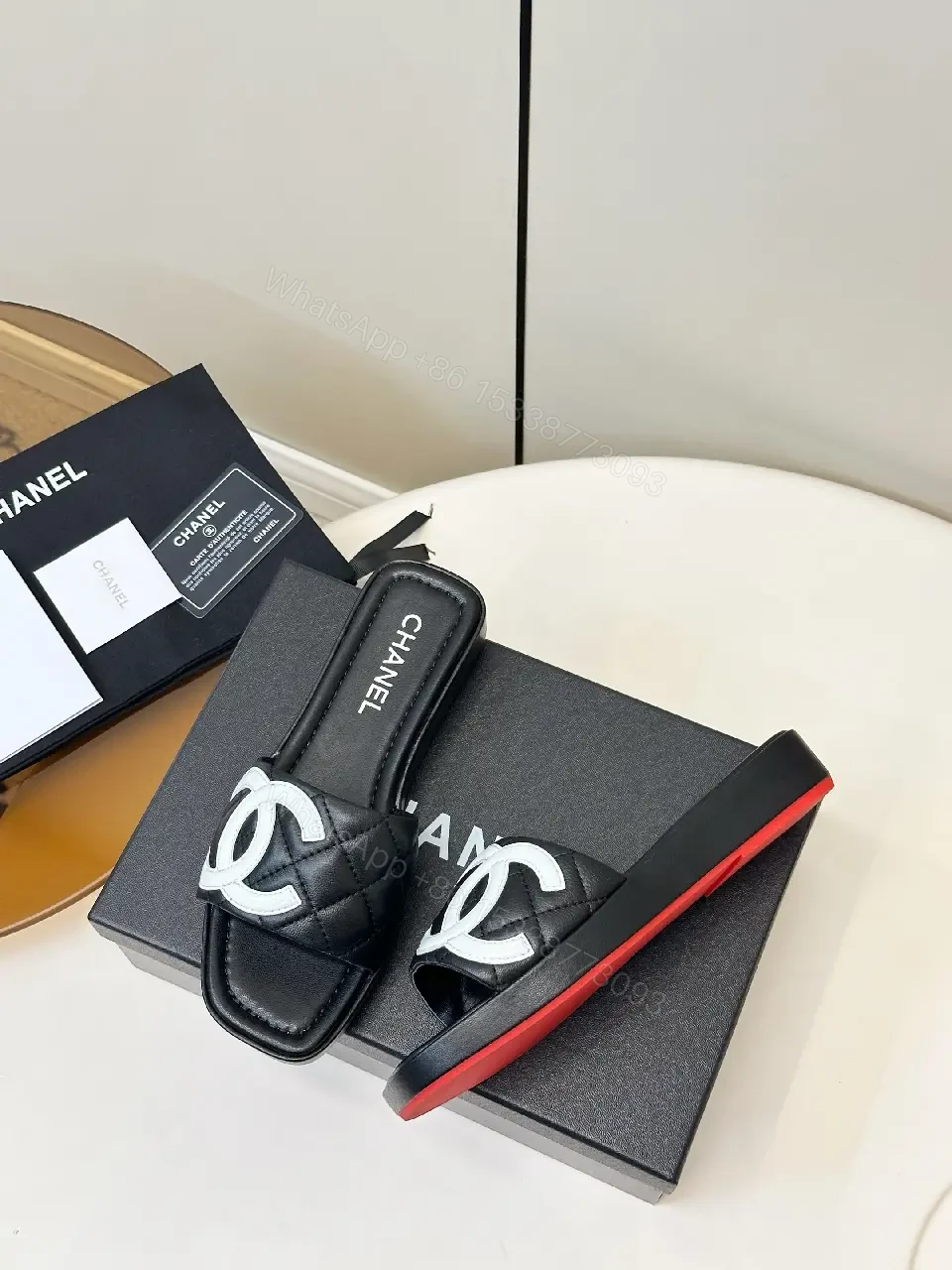 View 5 of Black Quilted Chanel Sliders with White Logo, Slide Sandals