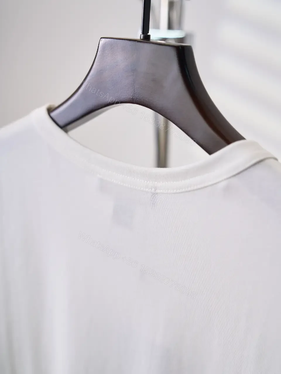 View 6 of White cotton T-shirt with luxury script embroidery for everyday elegance