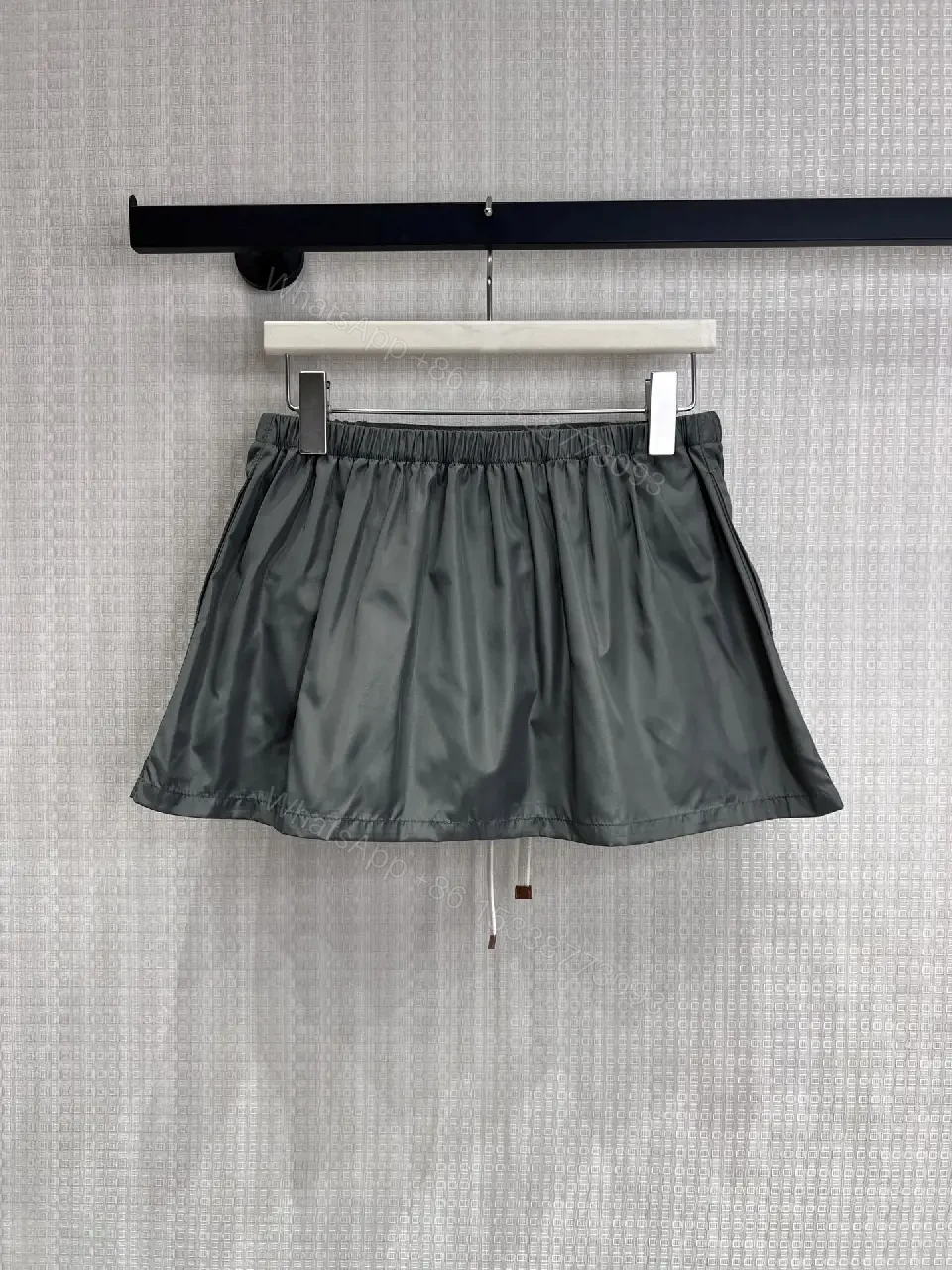 View 2 of Gray Nylon Mini Skirt Drawstring Waist Miu Miu Style Front Patch Pocket Skirt