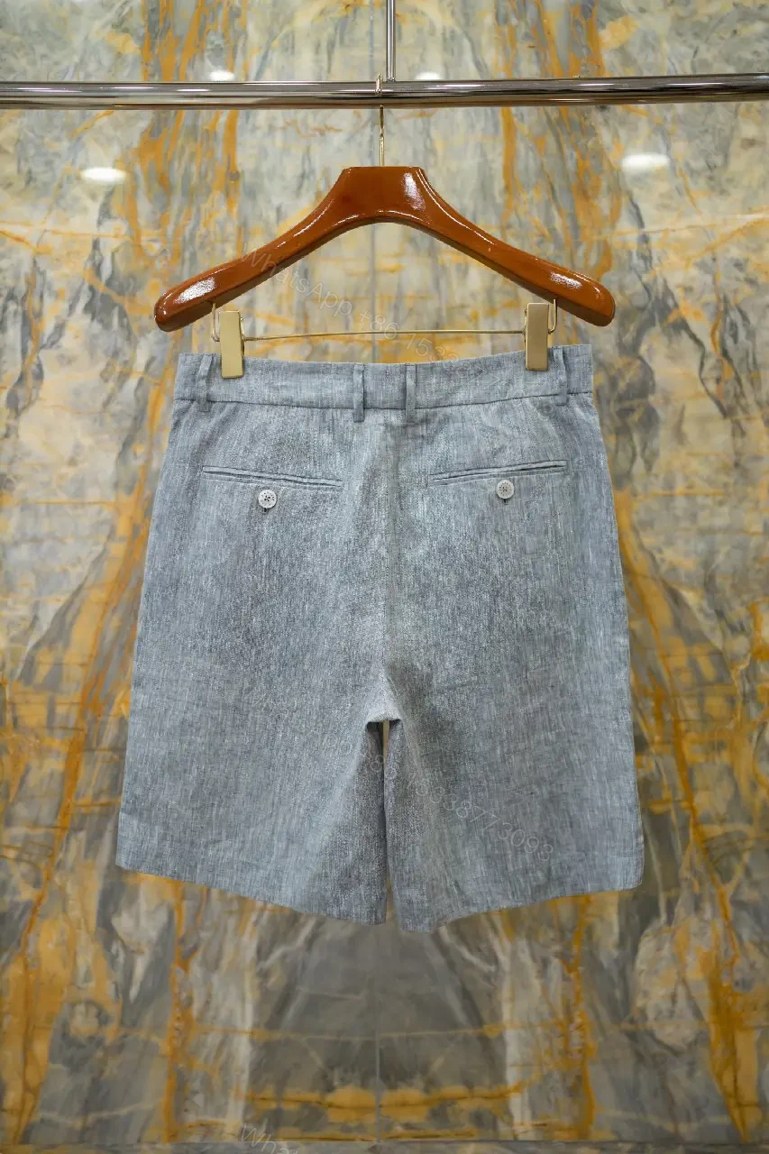 View 2 of light blue linen-blend shorts with front pockets for smart-casual wear