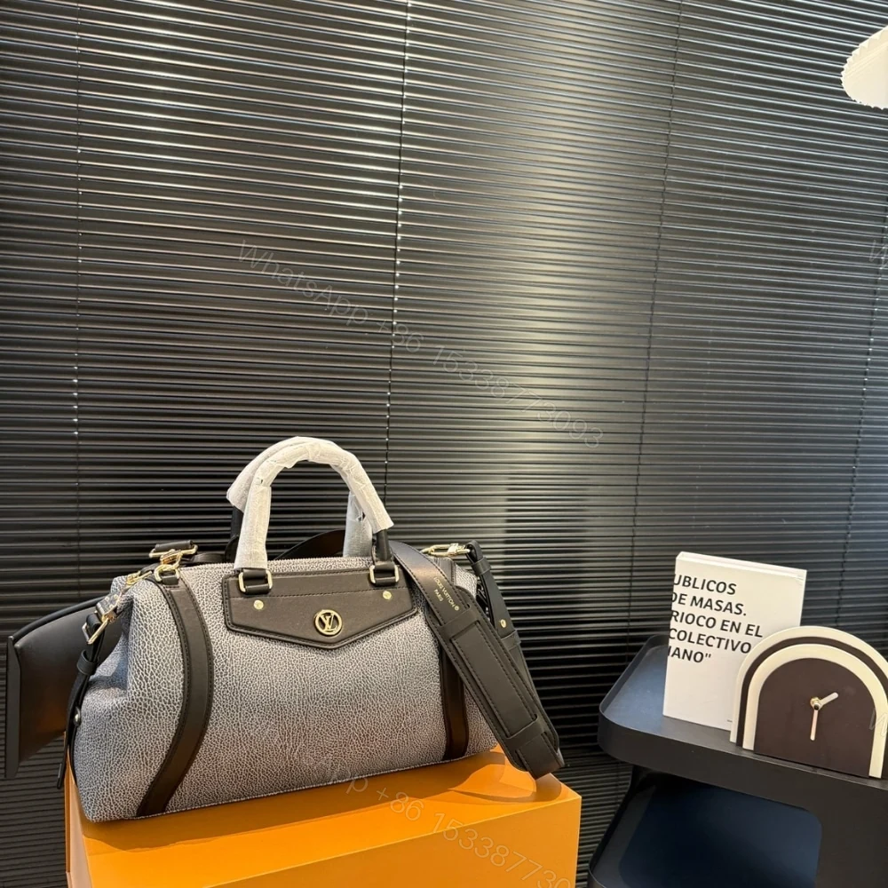 View 2 of LOUIS VUITTON LV BIKER MM DARK DENIM 37CM M14702