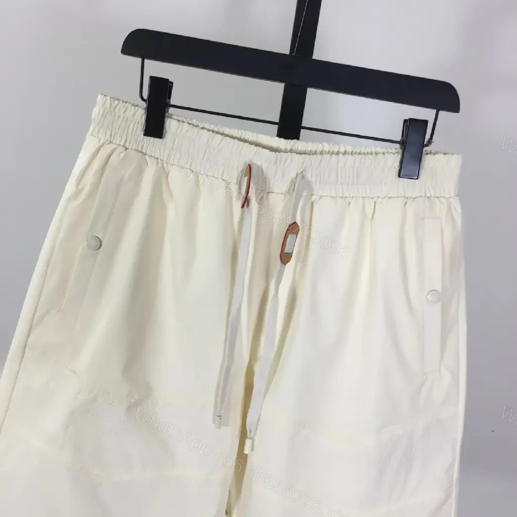 View 3 of Cream Canvas Shorts - Relaxed Style, Drawstring Waist, LV Logo