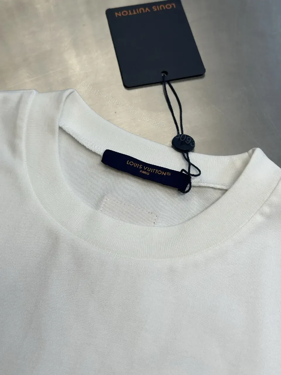 View 10 of Minimalist LV.M. Tee: Premium Cotton, Relaxed Fit, White